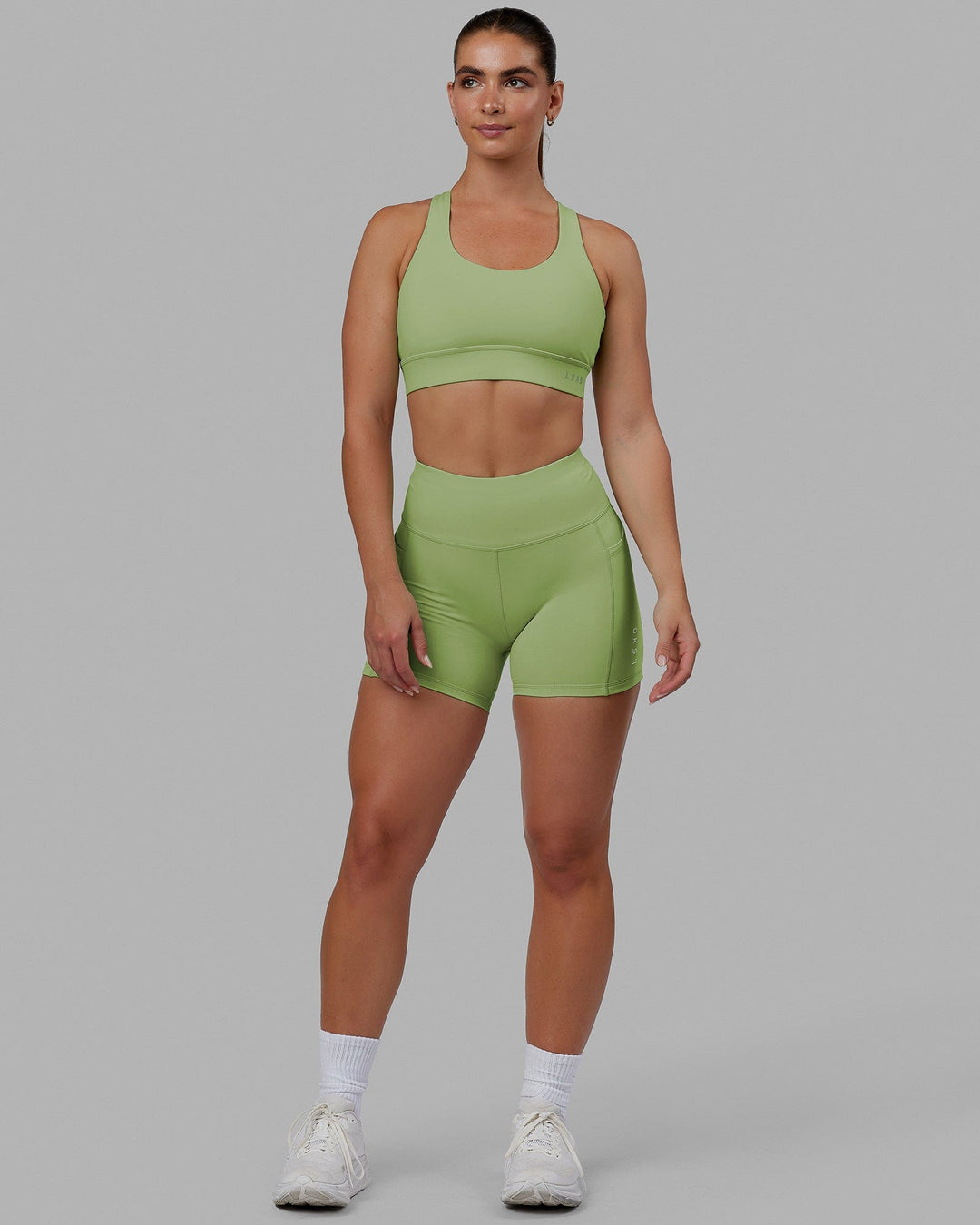 Woman wearing Rep X-Short Tights - Green Fig