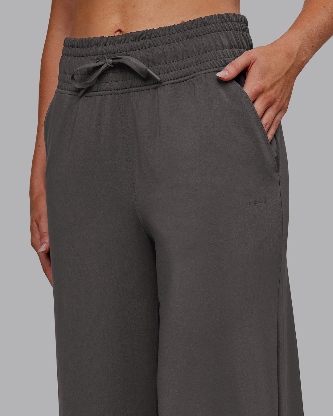 Woman wearing Restore CloudFLX Wide Leg Pant - Dark Storm | Model:Paris | Size:S