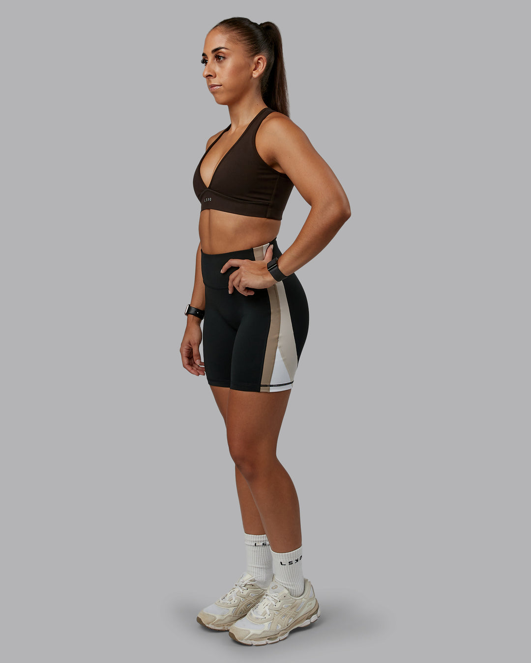 Woman wearing Revitalise Ultra High-Rise 6" Short - Black-Multi | Model:Tylah | Size:S