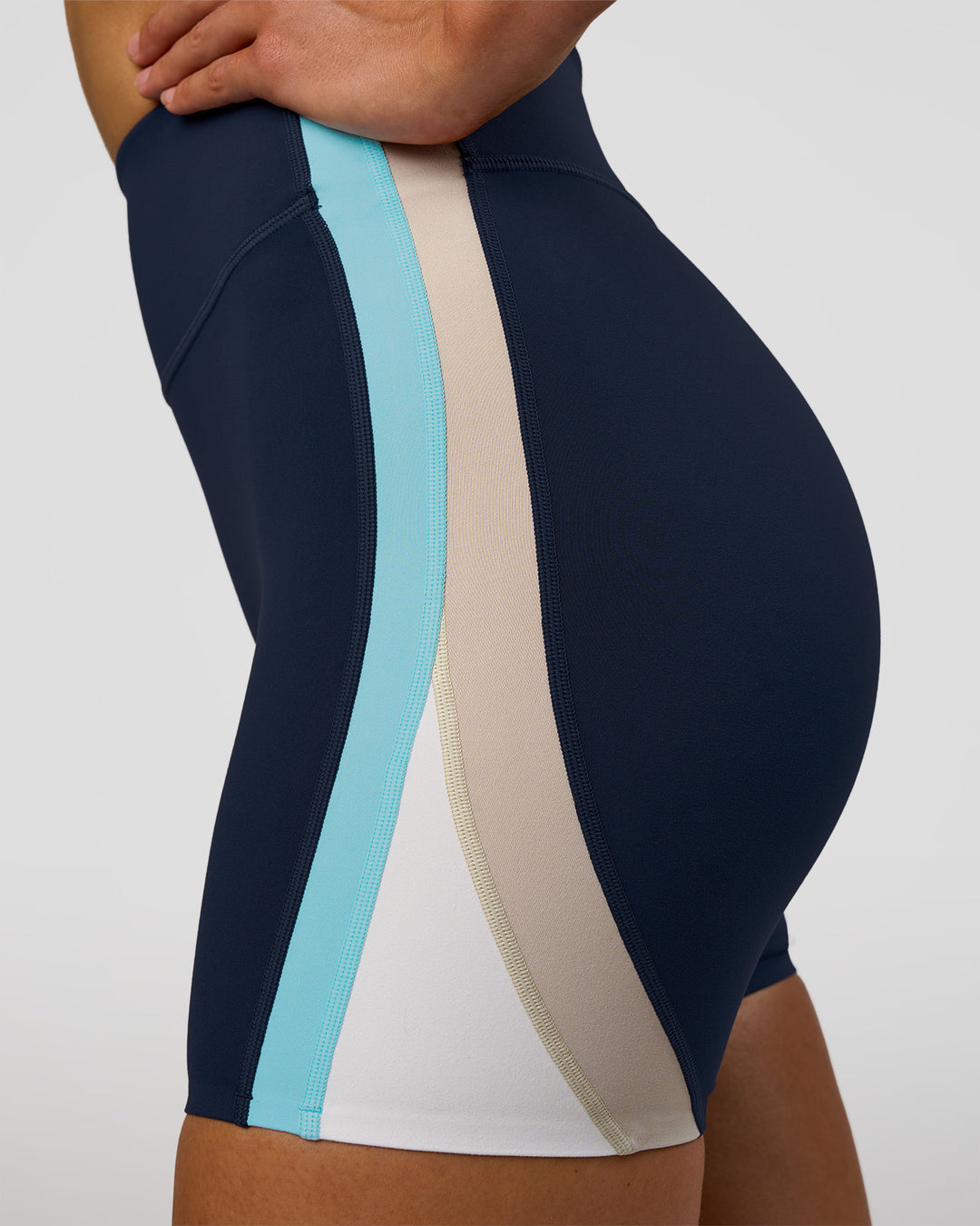 Woman wearing Revitalise Ultra High-Rise 6" Short - Future Navy-Multi | Model:Evie | Size:S