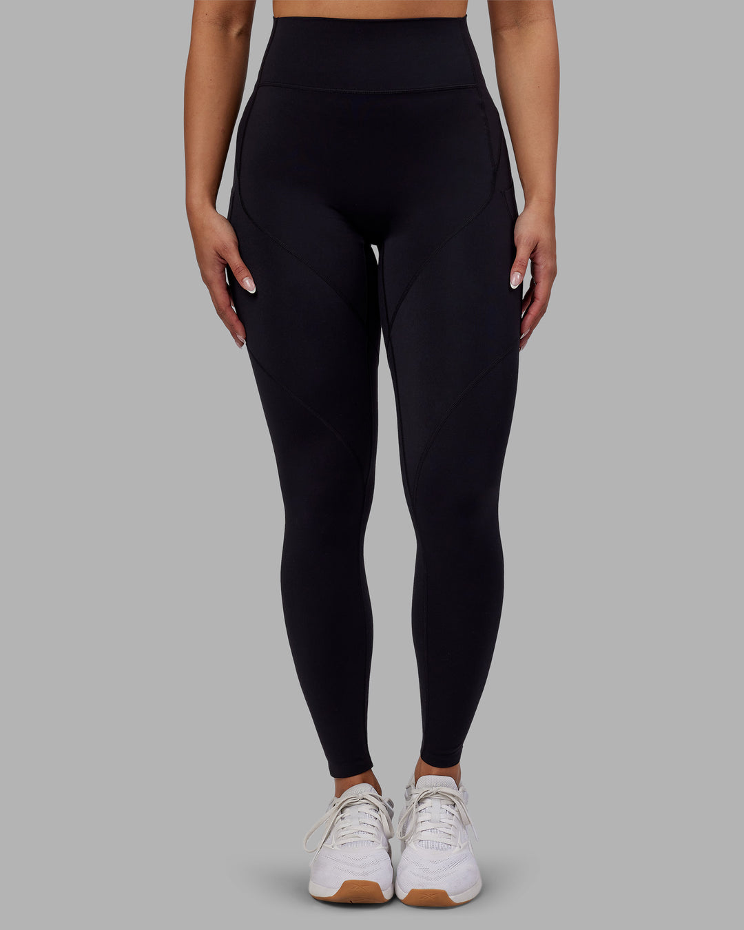 Woman wearing Rhythm Elixir Ultra High-Rise Full Length Legging Pockets - Black | Model:Ayla | Size:S