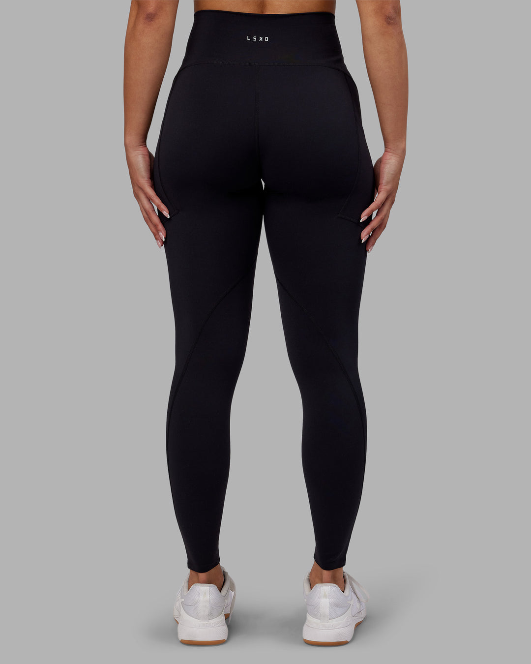 Woman wearing Rhythm Elixir Ultra High-Rise Full Length Legging Pockets - Black | Model:Ayla | Size:S