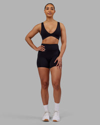 Woman wearing Rhythm Elixir Ultra High-Rise 4" Short - Black | Model:Ayla | Size:S | Thumbnail Index: 6
