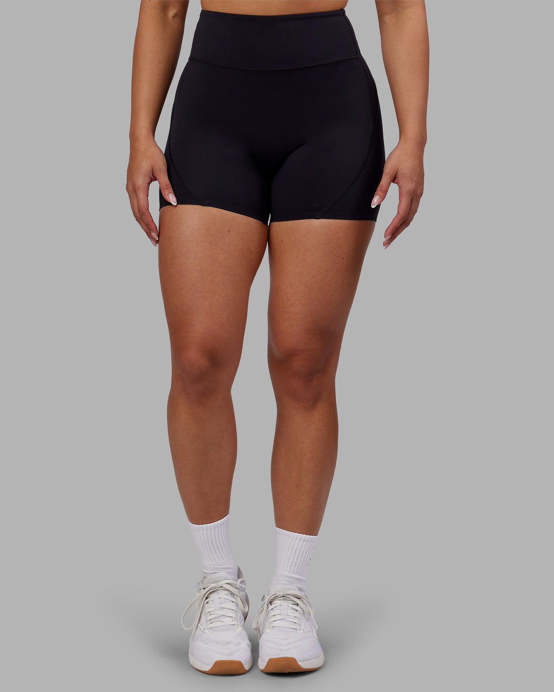 Woman wearing Rhythm Elixir Ultra High-Rise 4" Short - Black | Model:Ayla | Size:S - view 6