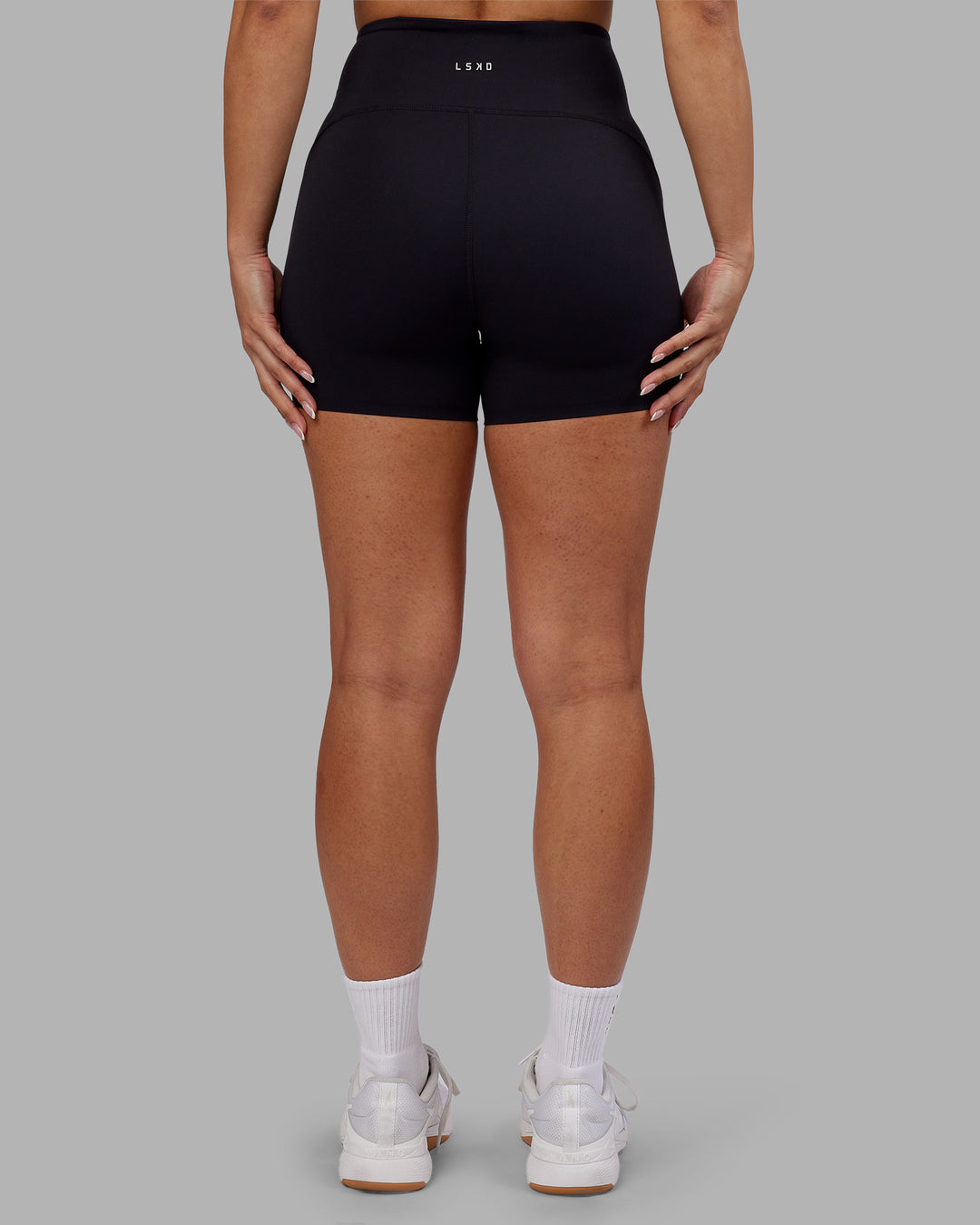 Woman wearing Rhythm Elixir Ultra High-Rise 4" Short - Black | Model:Ayla | Size:S - view 9