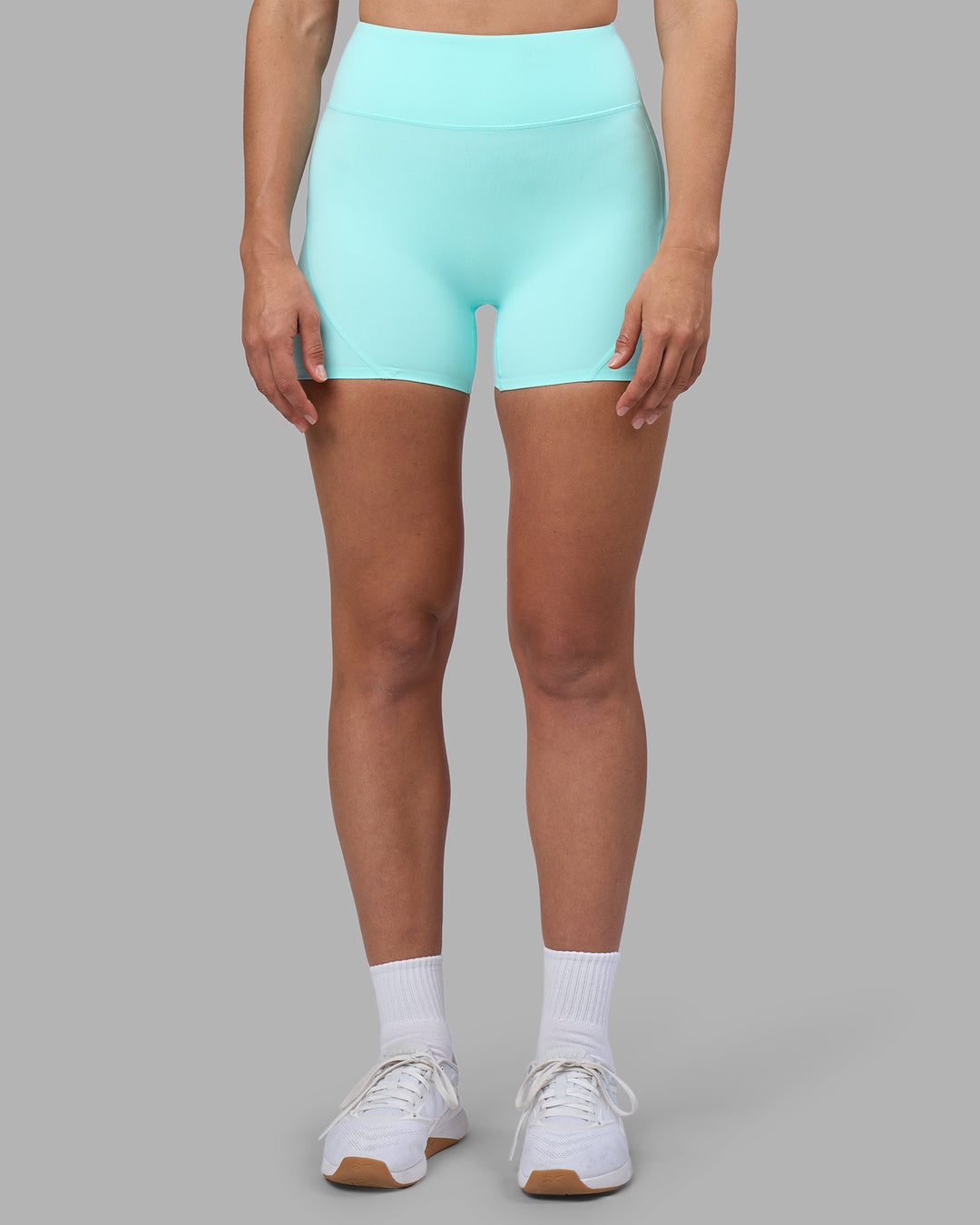 Woman wearing Rhythm Elixir Ultra High-Rise 4" Short - Island Paradise | Model:Sophie | Size:S