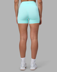 Woman wearing Rhythm Elixir Ultra High-Rise 4" Short - Island Paradise | Model:Sophie | Size:S