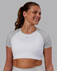 Woman wearing Run With It Ultra Cropped Tee - White-Grey Marl | Model:Phoebe | Size:S