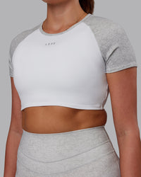 Woman wearing Run With It Ultra Cropped Tee - White-Grey Marl | Model:Phoebe | Size:S