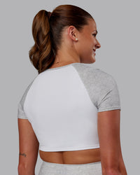 Woman wearing Run With It Ultra Cropped Tee - White-Grey Marl | Model:Phoebe | Size:S