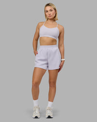 Woman wearing Rush Sports Bra - Lilac Smoke | Model:Halle | Size:S