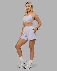 Woman wearing Rush Sports Bra - Lilac Smoke | Model:Halle | Size:S