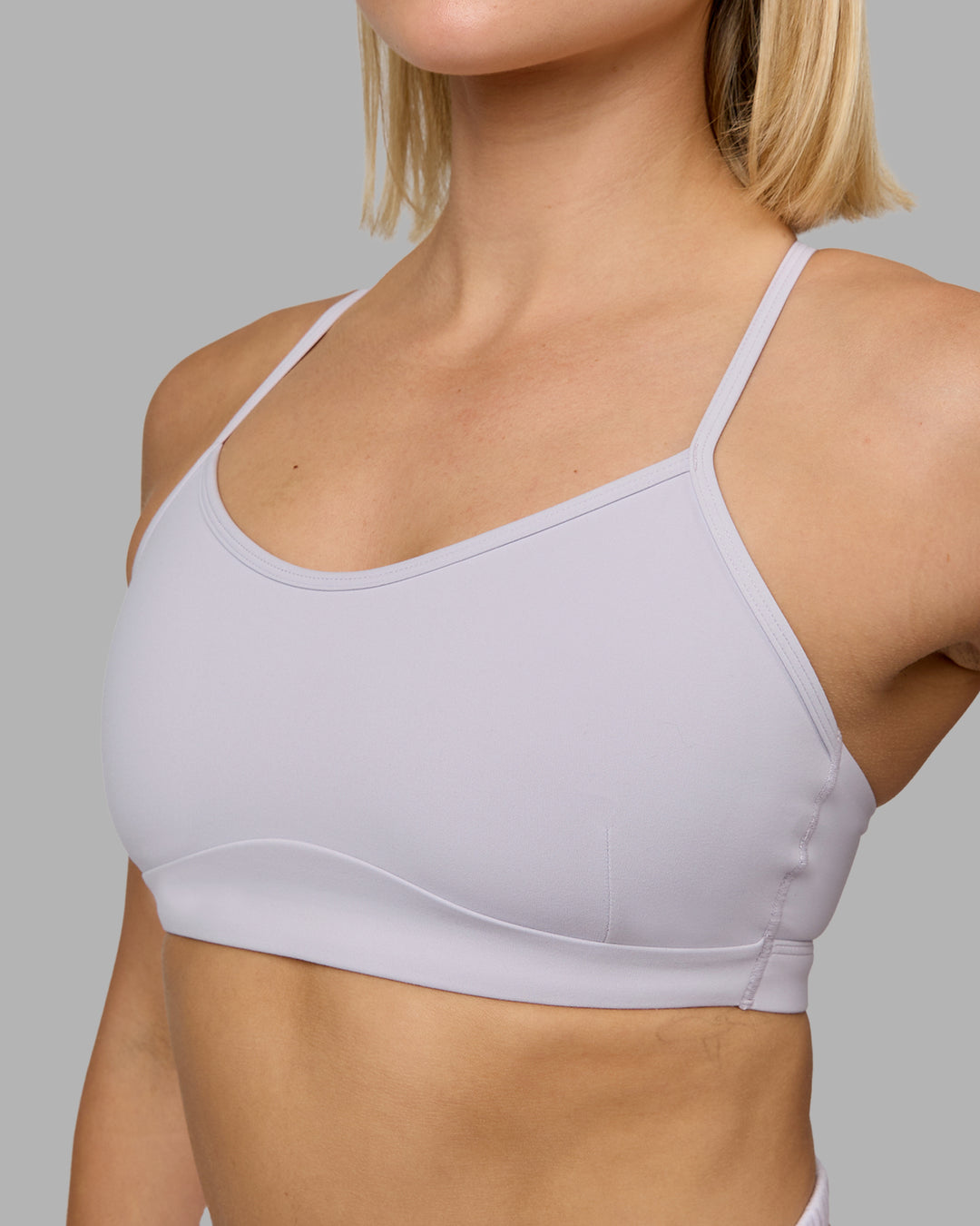 Woman wearing Rush Sports Bra - Lilac Smoke | Model:Halle | Size:S