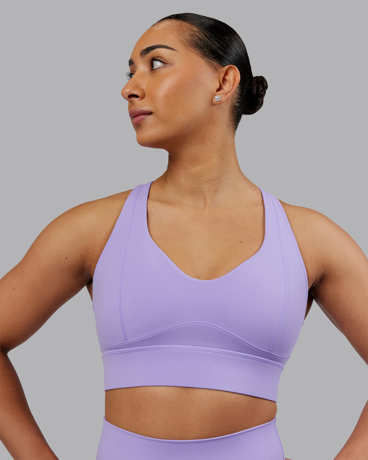 Woman wearing Sculpt Sports Bra - Violet Ray | Model:Ayla | Size:S