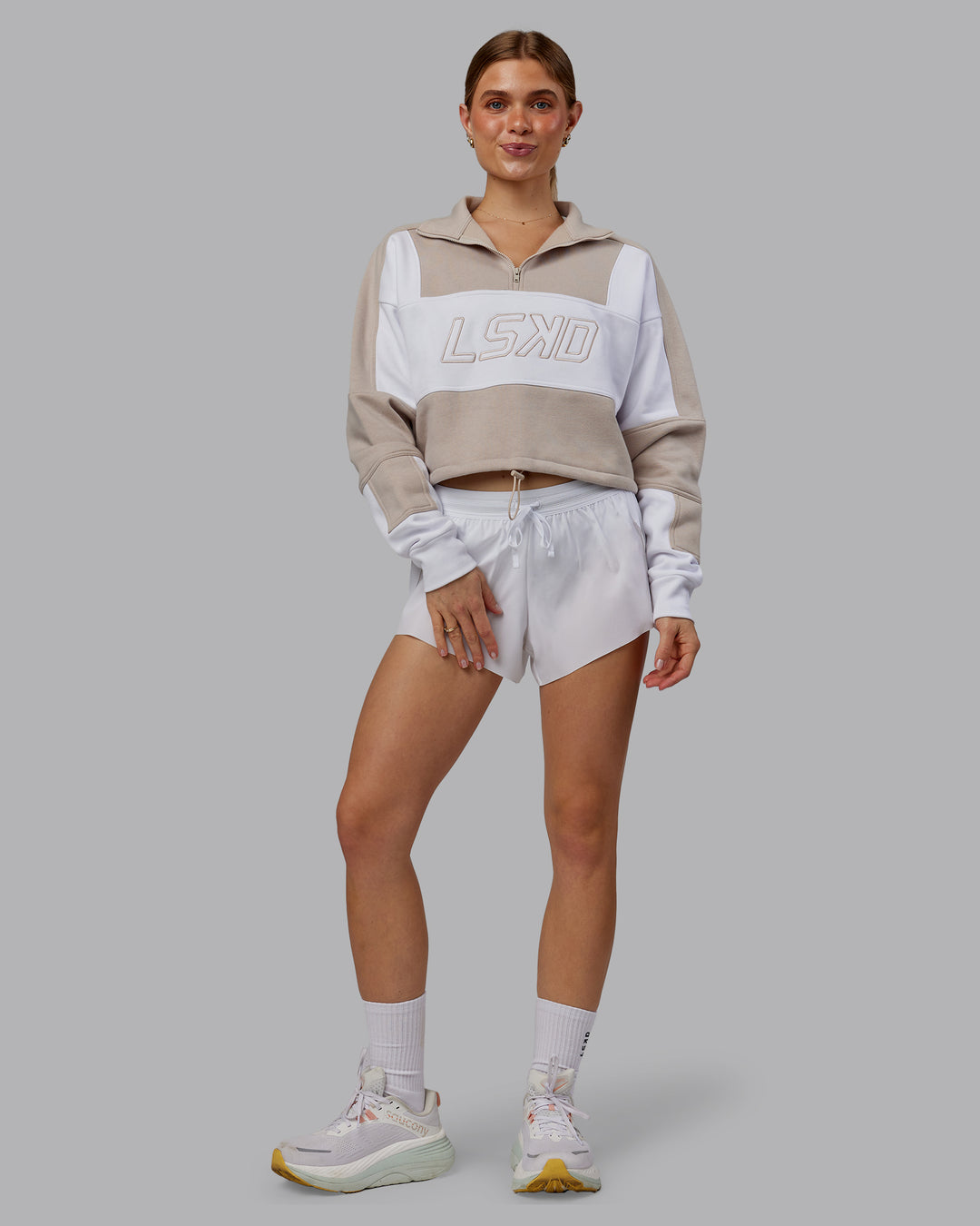 Woman wearing Slam Quarter Zip Sweater - Shale Beige-White | Model:Emilie | Size:S
