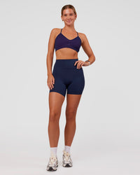 Woman wearing Spark Seamless Ribbed Sports Bra - Future Navy-Ultra Fuchsia | Model:Amity | Size:S