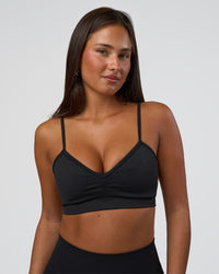 Woman wearing Spark Seamless Sports Bra - Black | Model:Bianca | Size:S