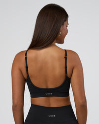 Woman wearing Spark Seamless Sports Bra - Black | Model:Bianca | Size:S