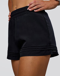 Woman wearing Sport Short 2.5" - Black | Model:Emelia | Size:S