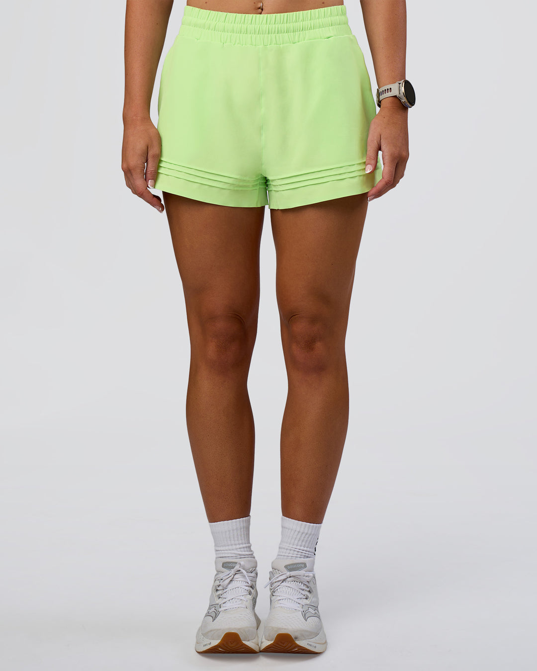 Woman wearing Sport Short 2.5" - Solar Lime | Model:Emelia | Size:S