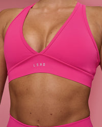 Woman wearing Stamina Rise Sports Bra - Ultra Pink | Model:Hannah | Size:S