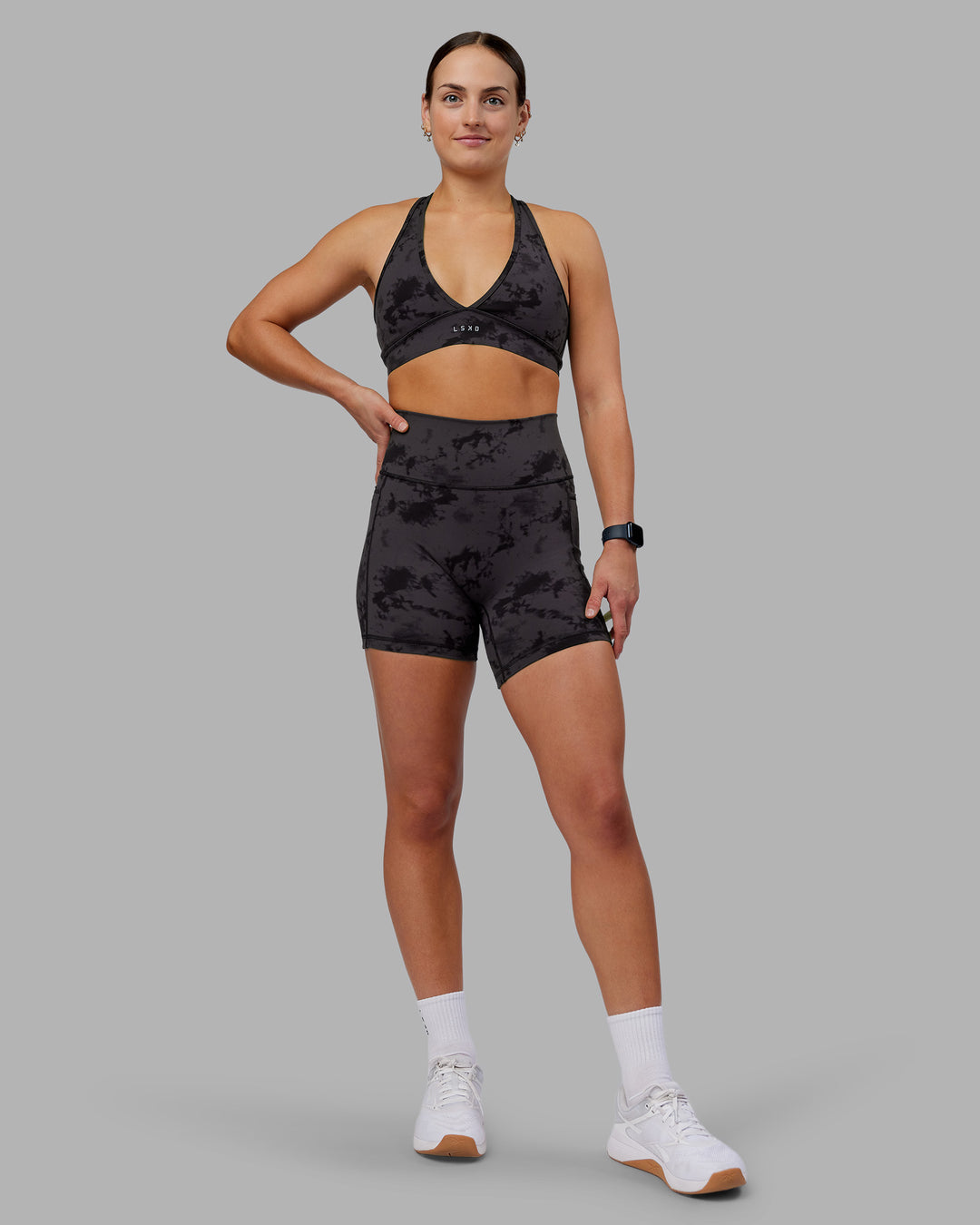 Woman wearing Stamina Sports Bra - Black Tie Dye | Model:Keisha | Size:S - view 4