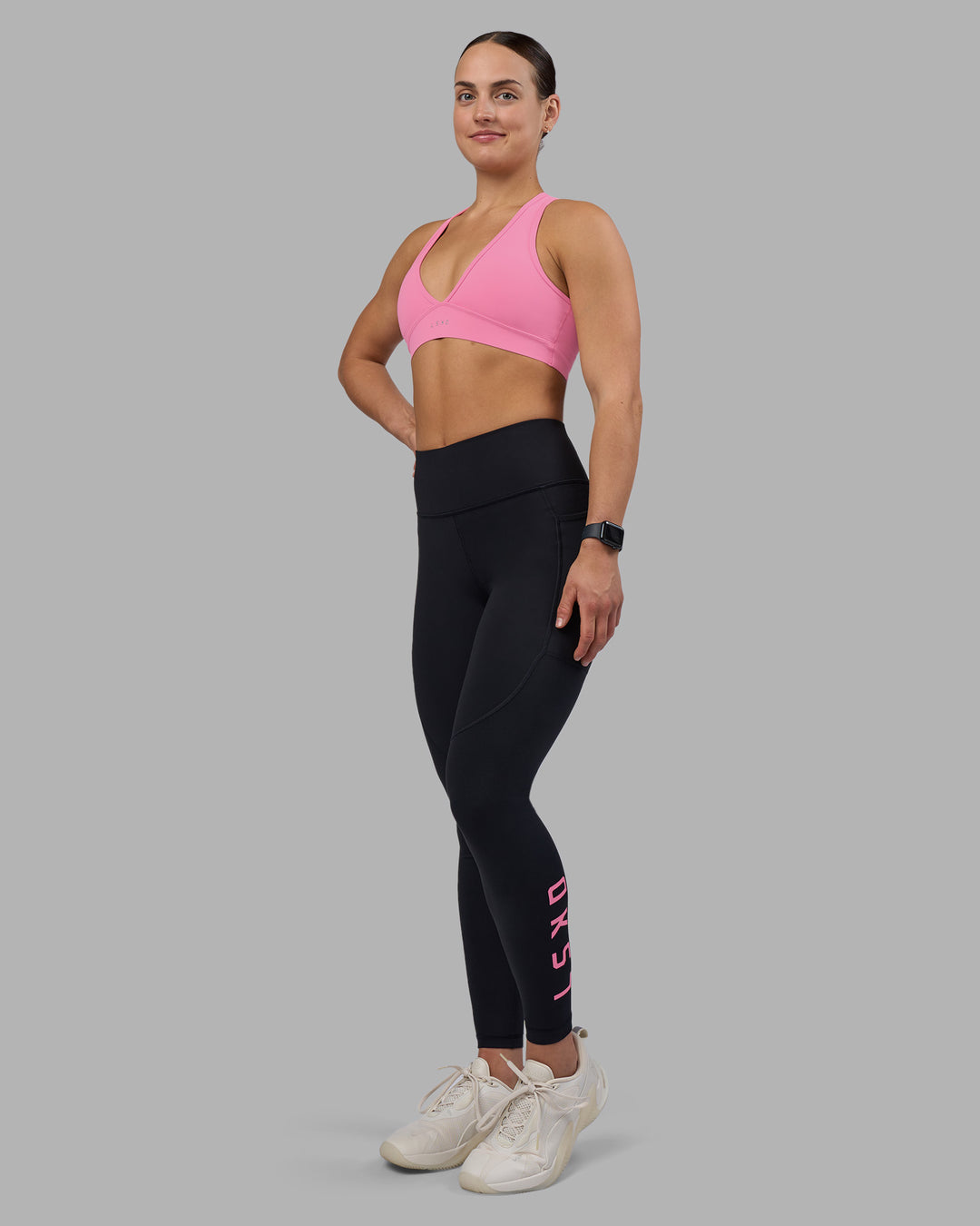 Woman wearing Stamina Sports Bra - Candy Pink | Model:Keisha | Size:S