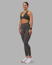 Woman wearing Stamina Sports Bra - Dark Storm | Model:Keisha | Size:S