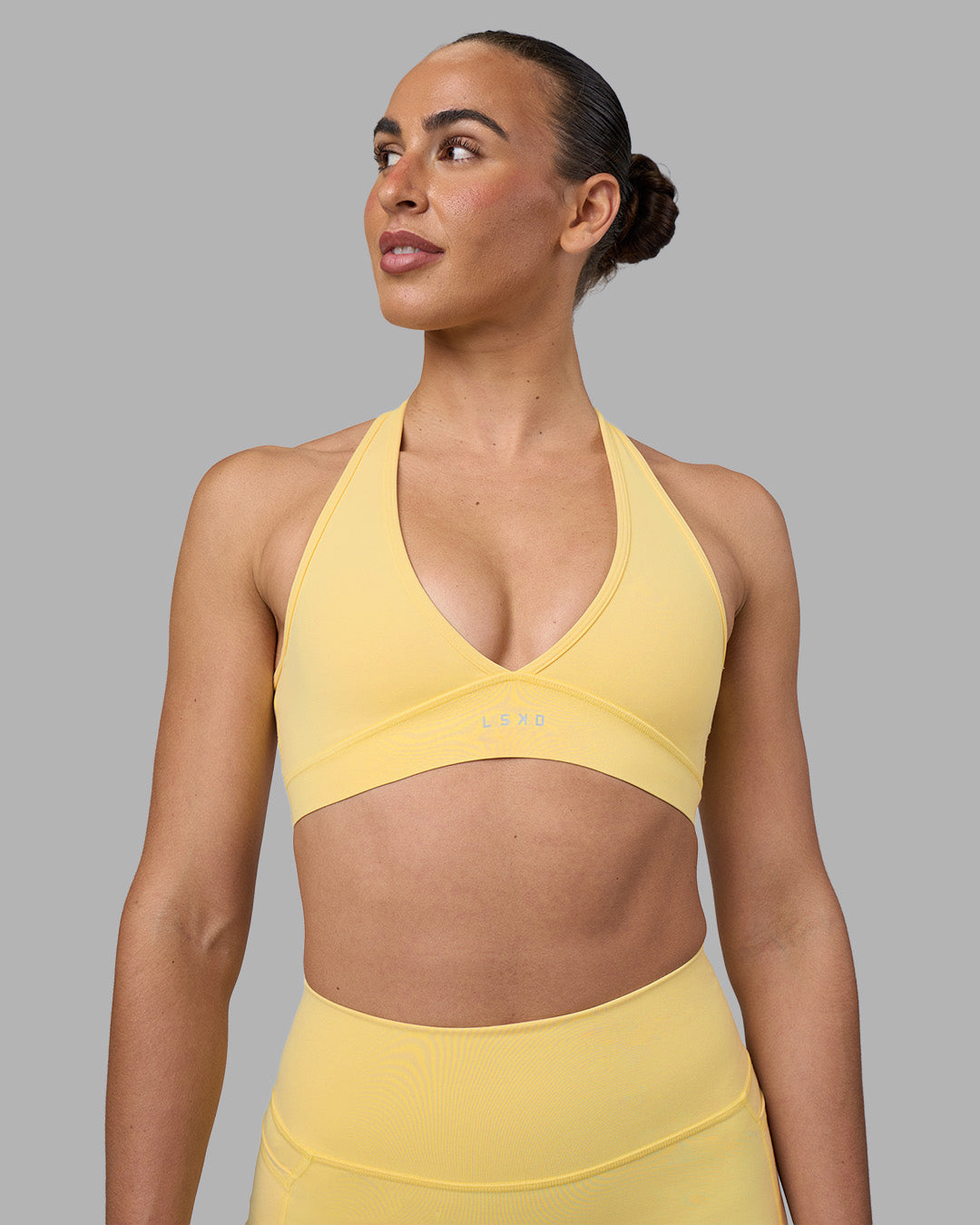 Woman wearing Stamina Sports Bra - Lemon | Model:Sophie | Size:S