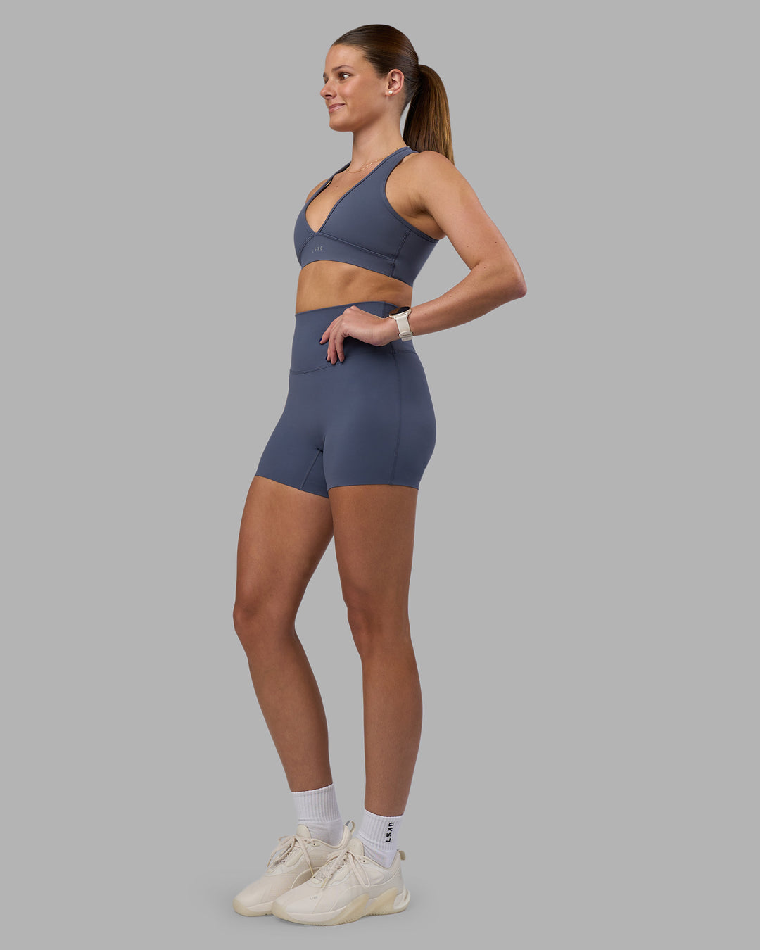 Woman wearing Stamina Sports Bra - Night Shadow | Model:Phoebe | Size:S
