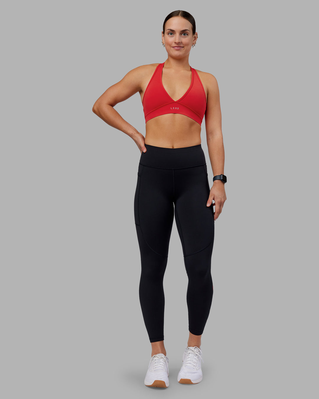 Woman wearing Stamina Sports Bra - Scarlet | Model:Keisha | Size:S