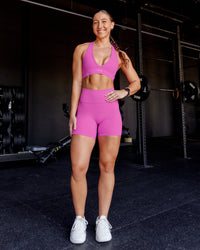 Woman wearing Stamina Sports Bra - Ultra Fuchsia | Model:Summer | Size:S