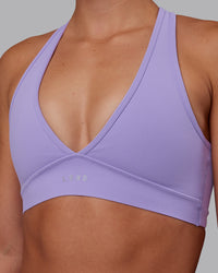 Woman wearing Stamina Sports Bra - Violet Ray | Model:Charlize | Size:S