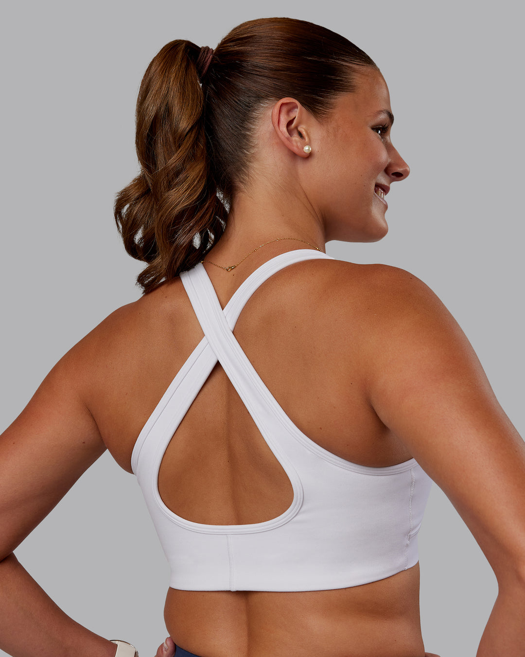 Woman wearing Stamina Sports Bra - White | Model:Phoebe | Size:S