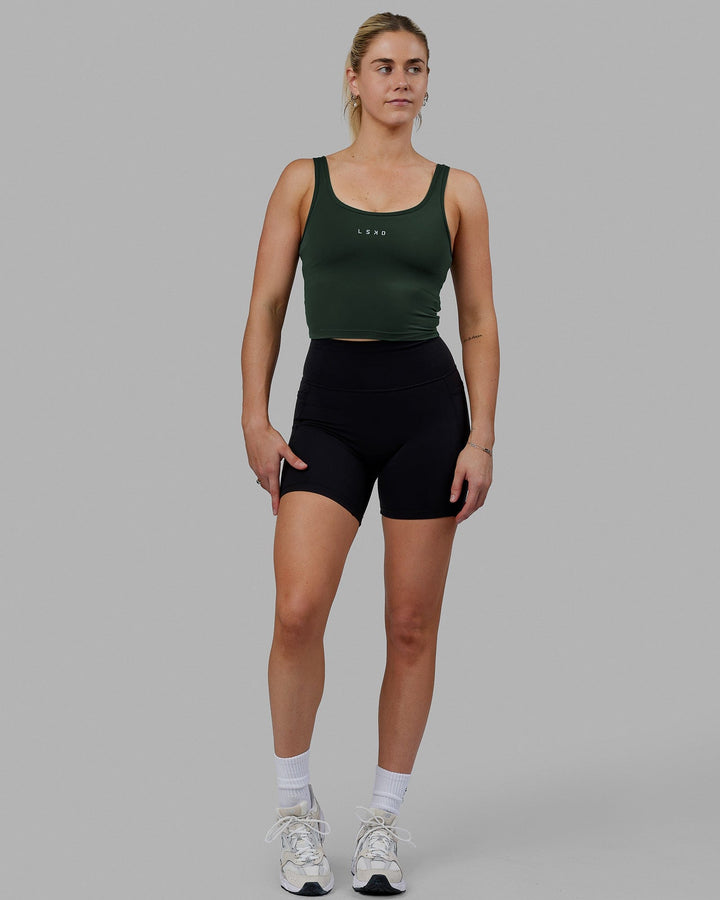 Woman wearing Staple Active Cropped Tank - Vital Green