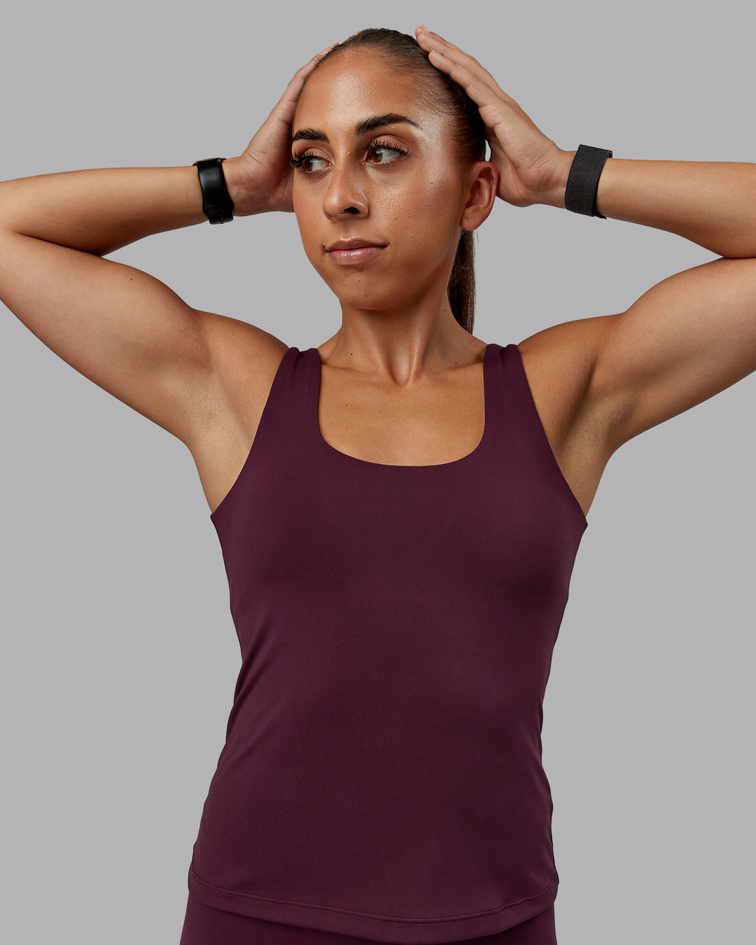Woman wearing Staple Active Shelf Bra Tank in Cherry Lacquer | Size:S