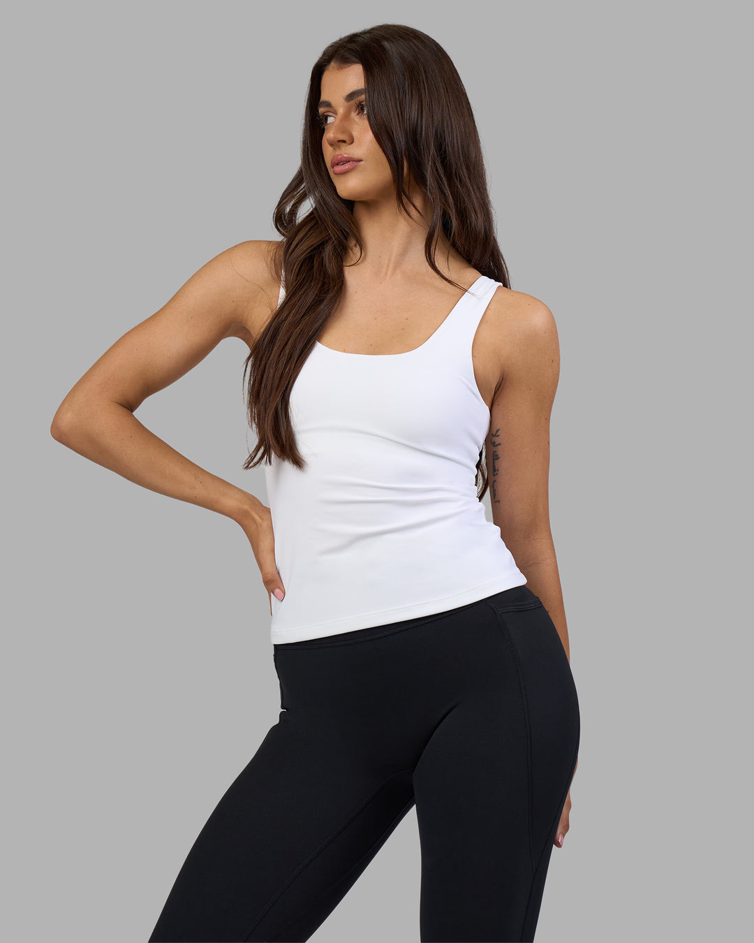 Woman wearing Staple Active Shelf Bra Tank - White | Model:Phoebe | Size:S