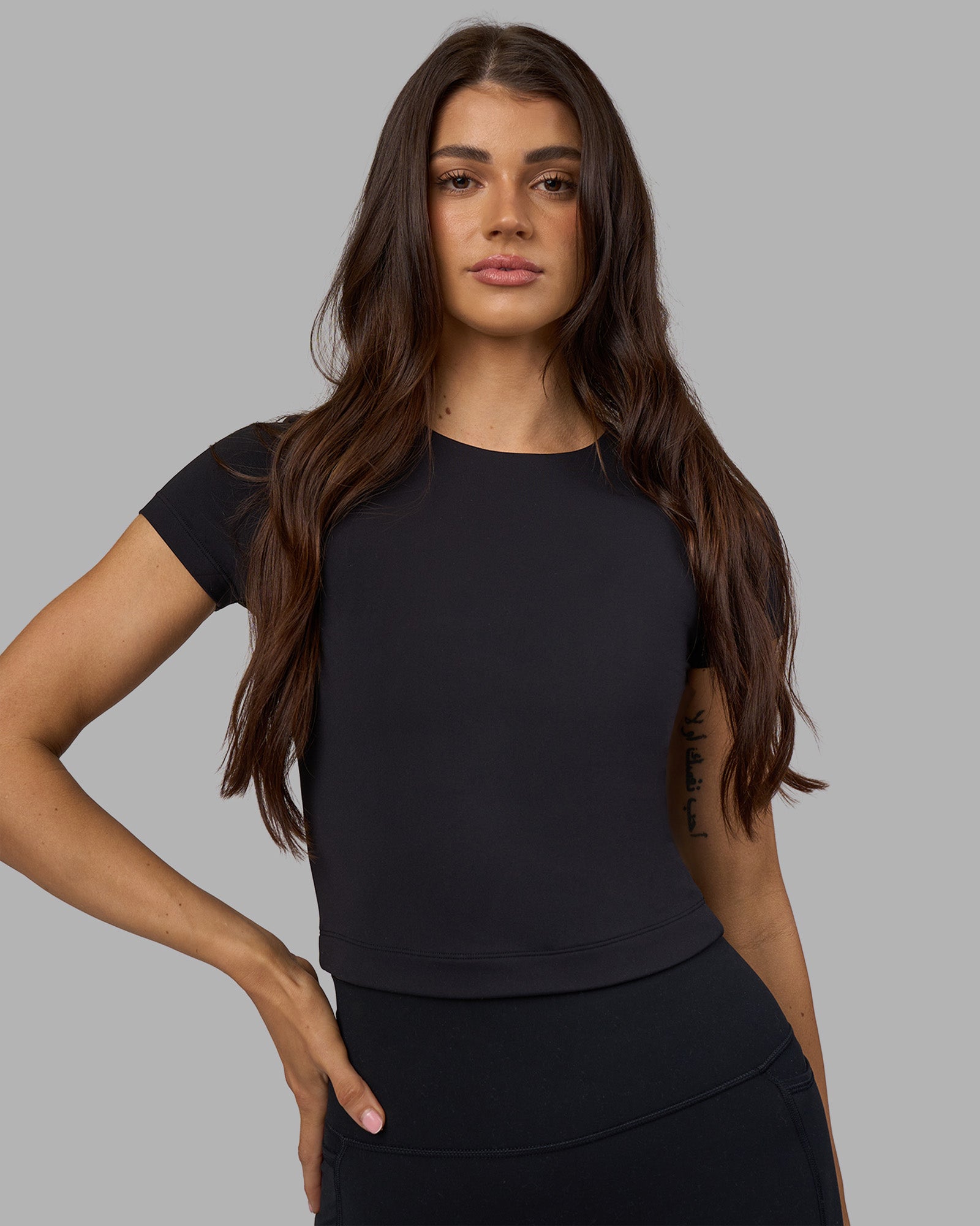 Woman wearing Staple Cropped Tee - Black | Model:Phoebe | Size:S