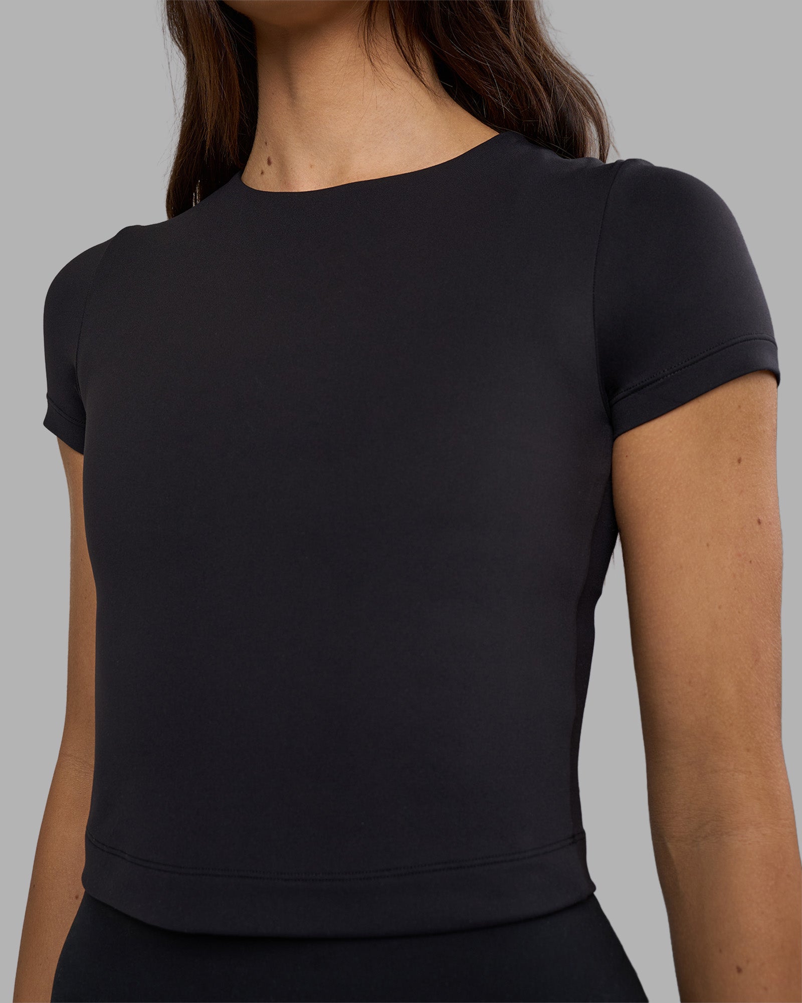 Woman wearing Staple Cropped Tee - Black | Model:Phoebe | Size:S