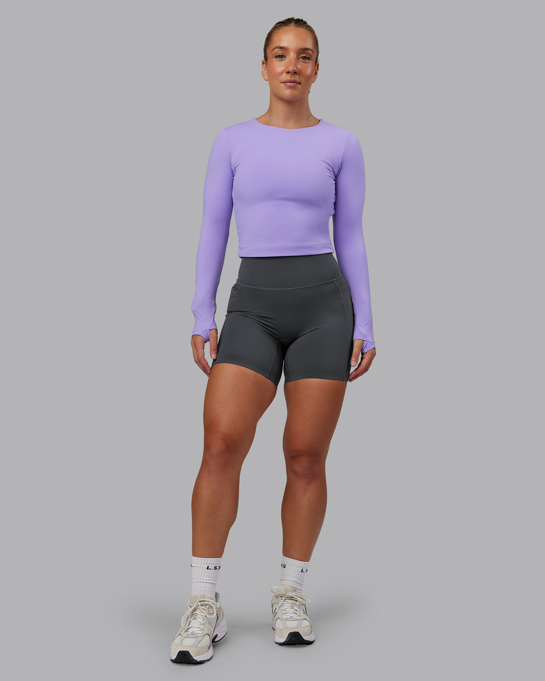 Woman wearing Staple Long Sleeve Cropped Tee in Violet Ray | Size:S