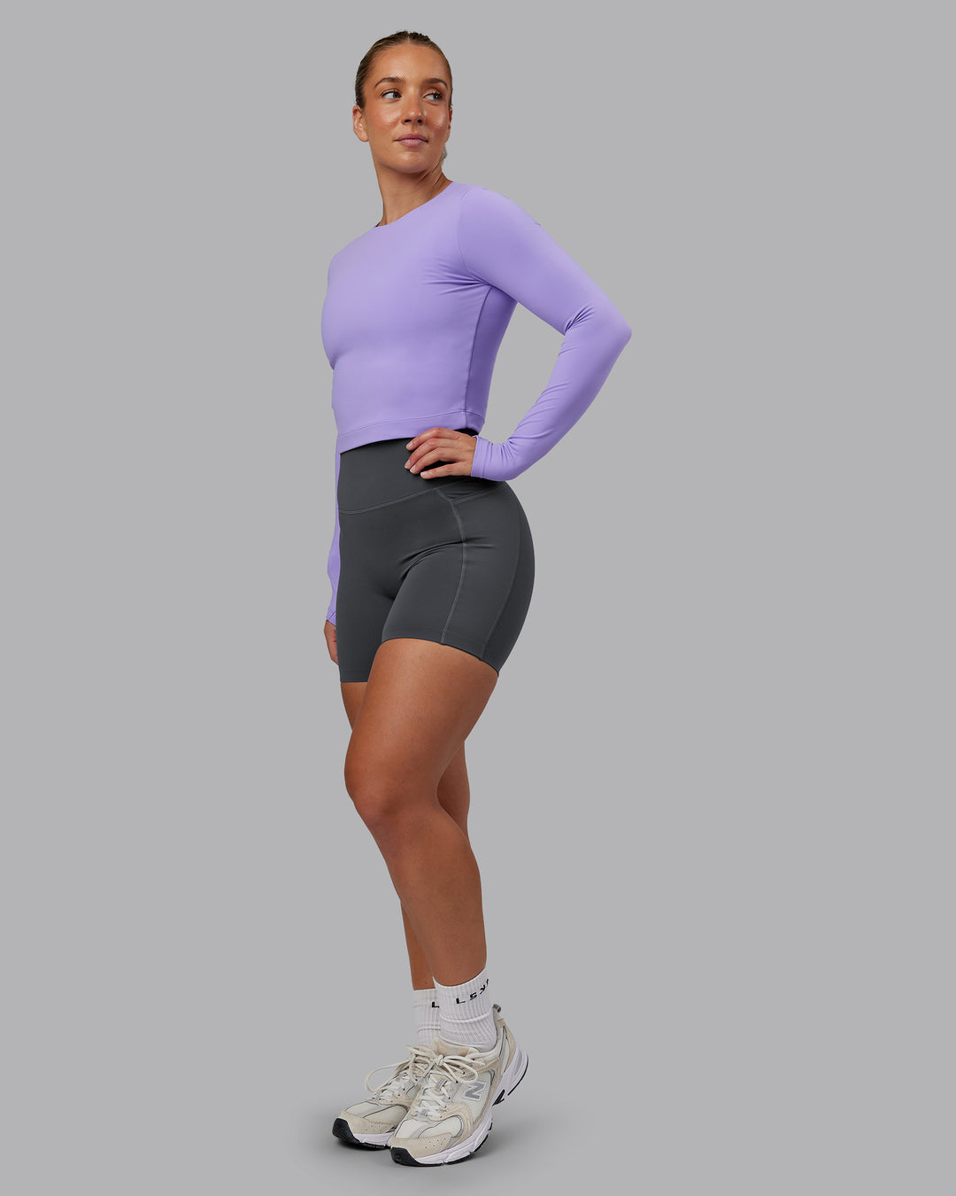 Woman wearing Staple Long Sleeve Cropped Tee in Violet Ray | Size:S
