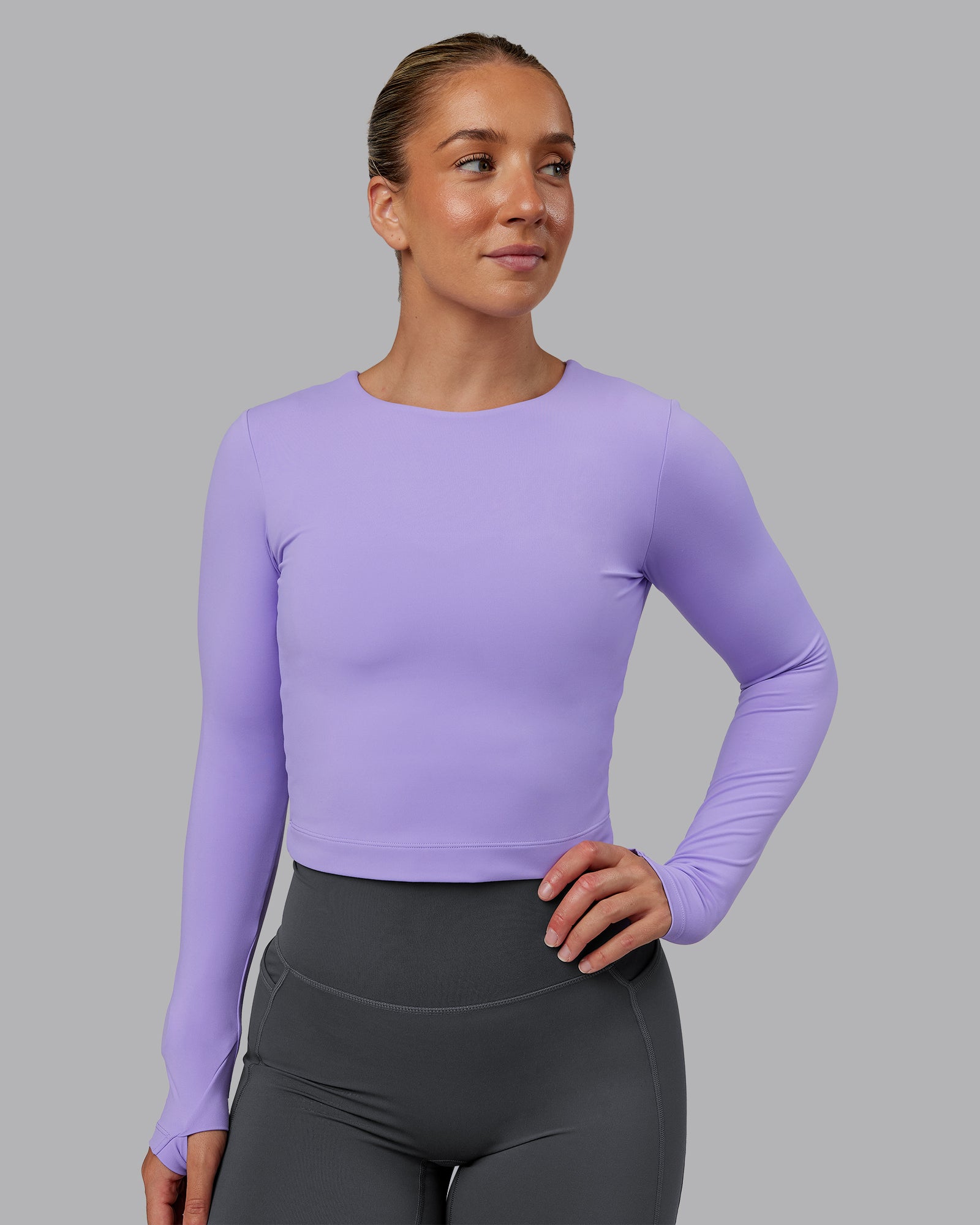 Woman wearing Staple Long Sleeve Cropped Tee in Violet Ray | Size:S
