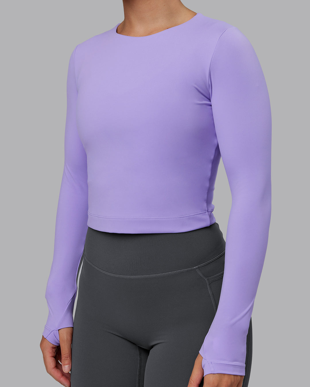 Woman wearing Staple Long Sleeve Cropped Tee in Violet Ray | Size:S