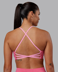 Woman wearing Stellar Sports Bra - Hot Pink | Model:Rhiley | Size:S