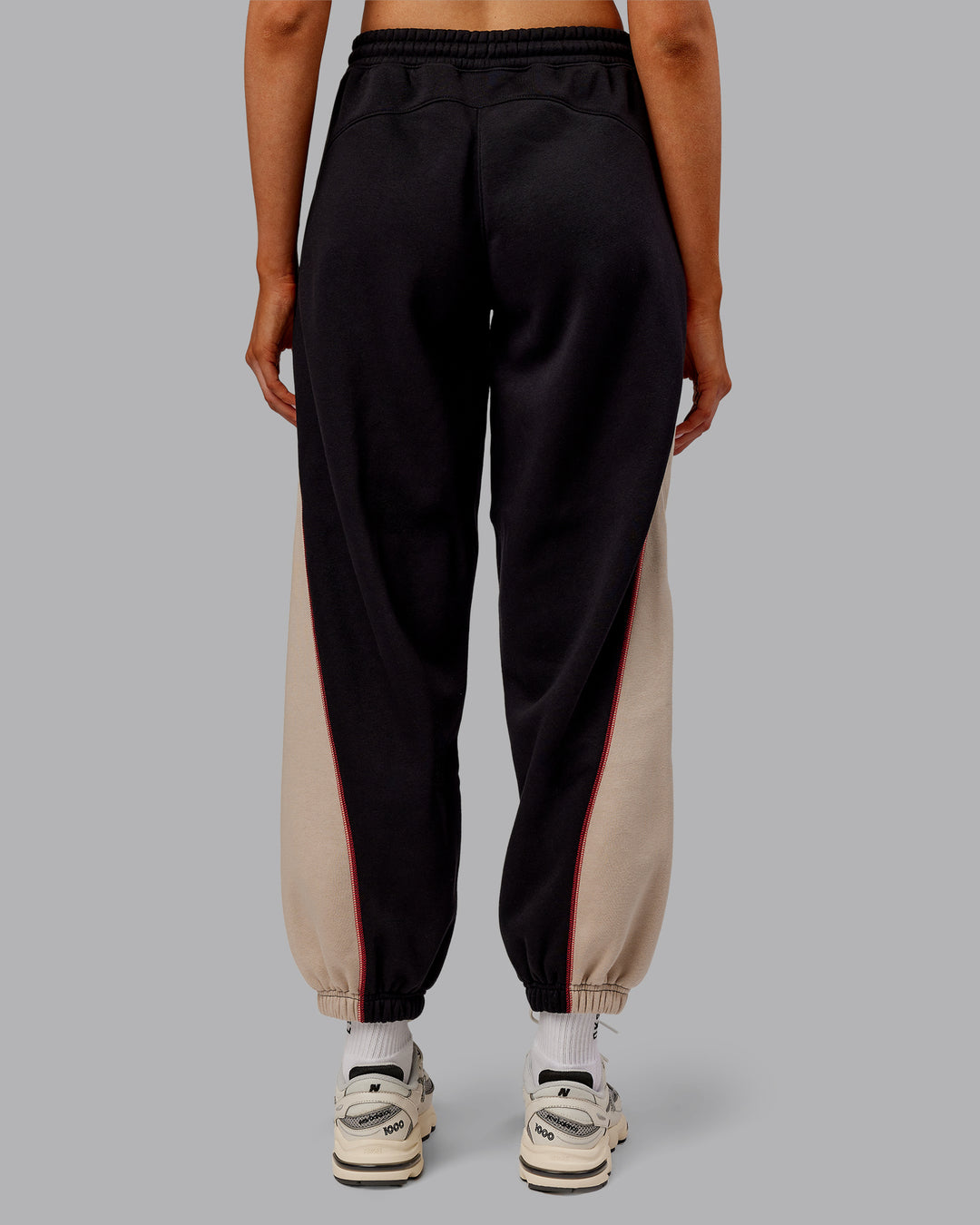 Woman wearing Stitch Up Fleece Sweat Pant - Black/Shale Beige | Model:Ella | Size:S