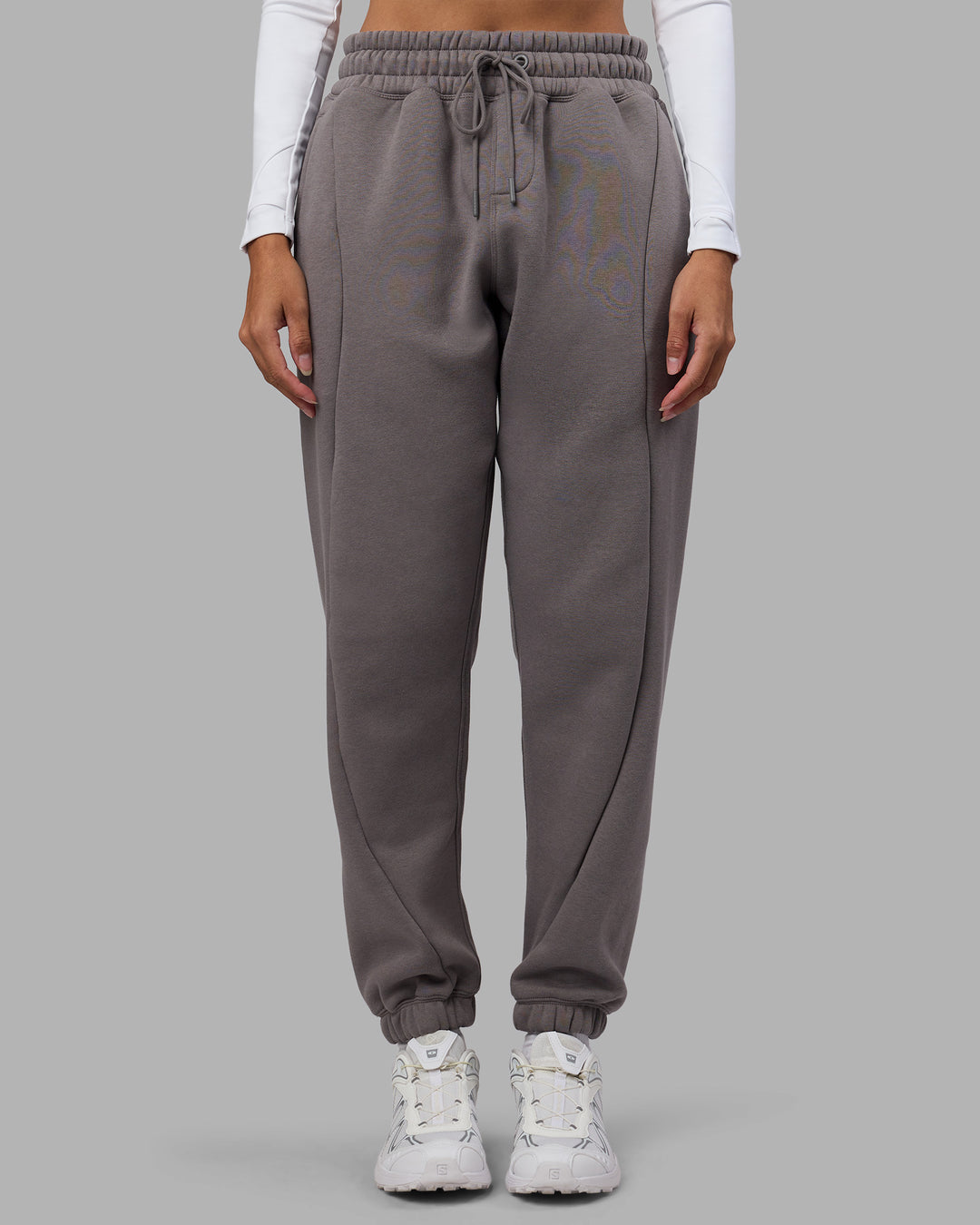 Woman wearing Stream Panel Track Pants - Storm Front | Model:Rhiley | Size:S