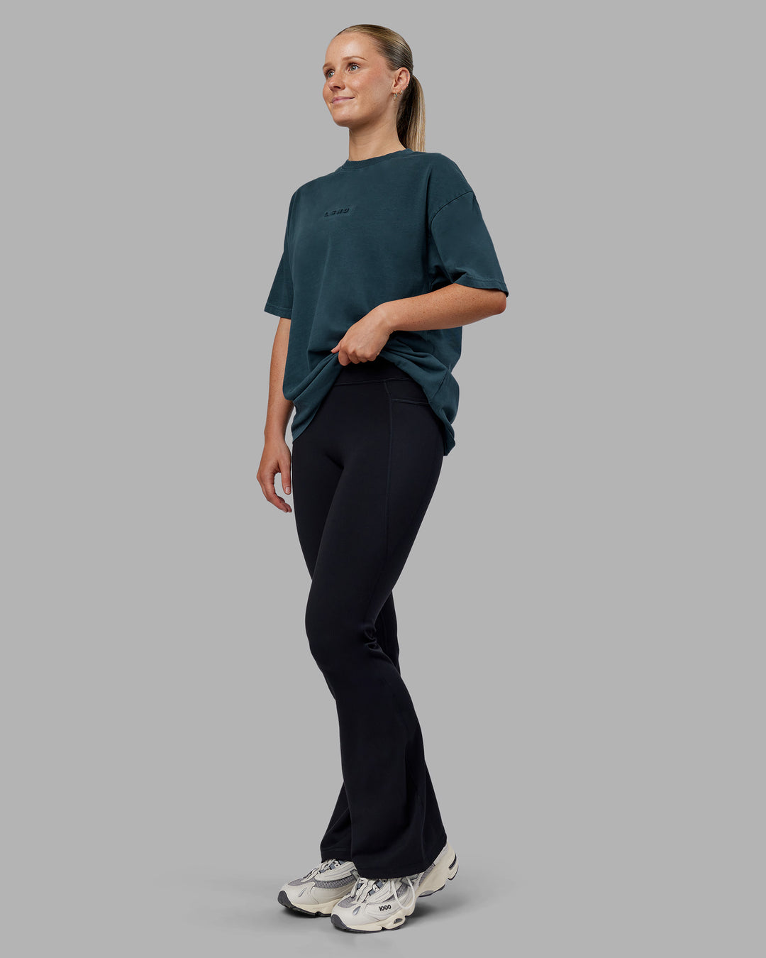 Woman wearing Stream Washed Heavyweight Oversized Tee - Washed Deep Sea | Model:Neve | Size:S