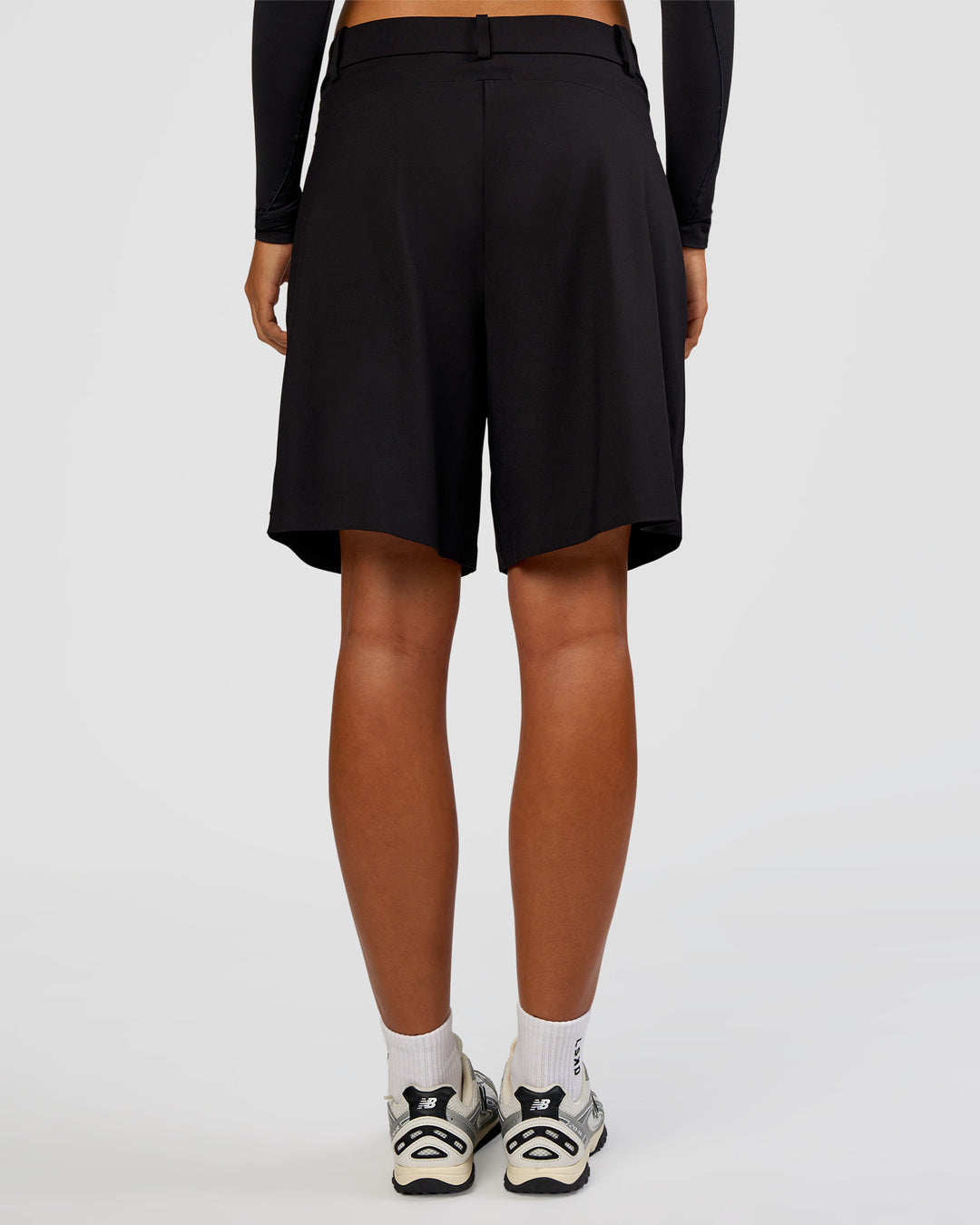 Woman wearing StretchShift Wide Leg Short - Black | Model:Ruby | Size:S