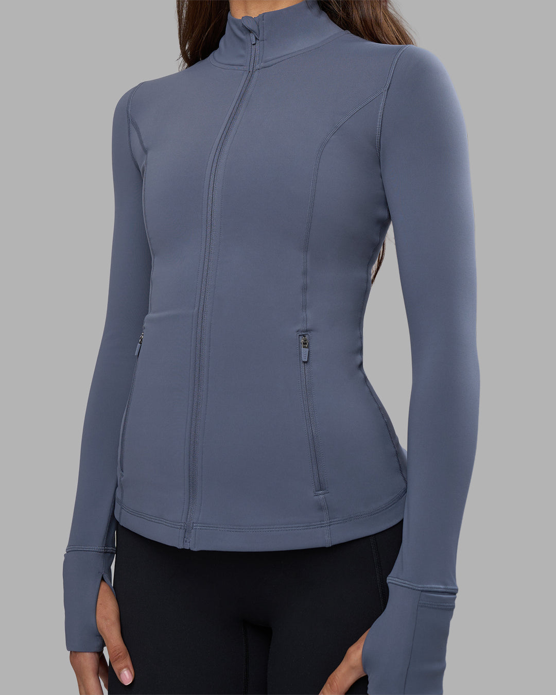Woman wearing Stride Zip Through Jacket - Night Shadow | Model:Phoebe | Size:S