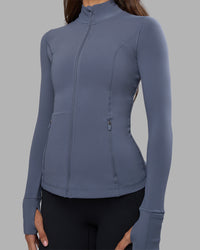 Woman wearing Stride Zip Through Jacket - Night Shadow | Model:Phoebe | Size:S